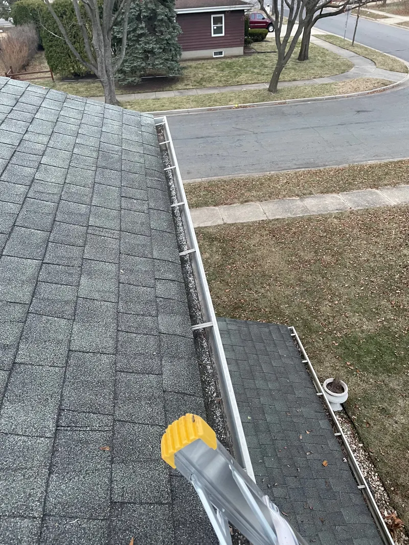 Printed gutter inspection report from The Total Wash Co. documenting condition, leaks, and pitch issues