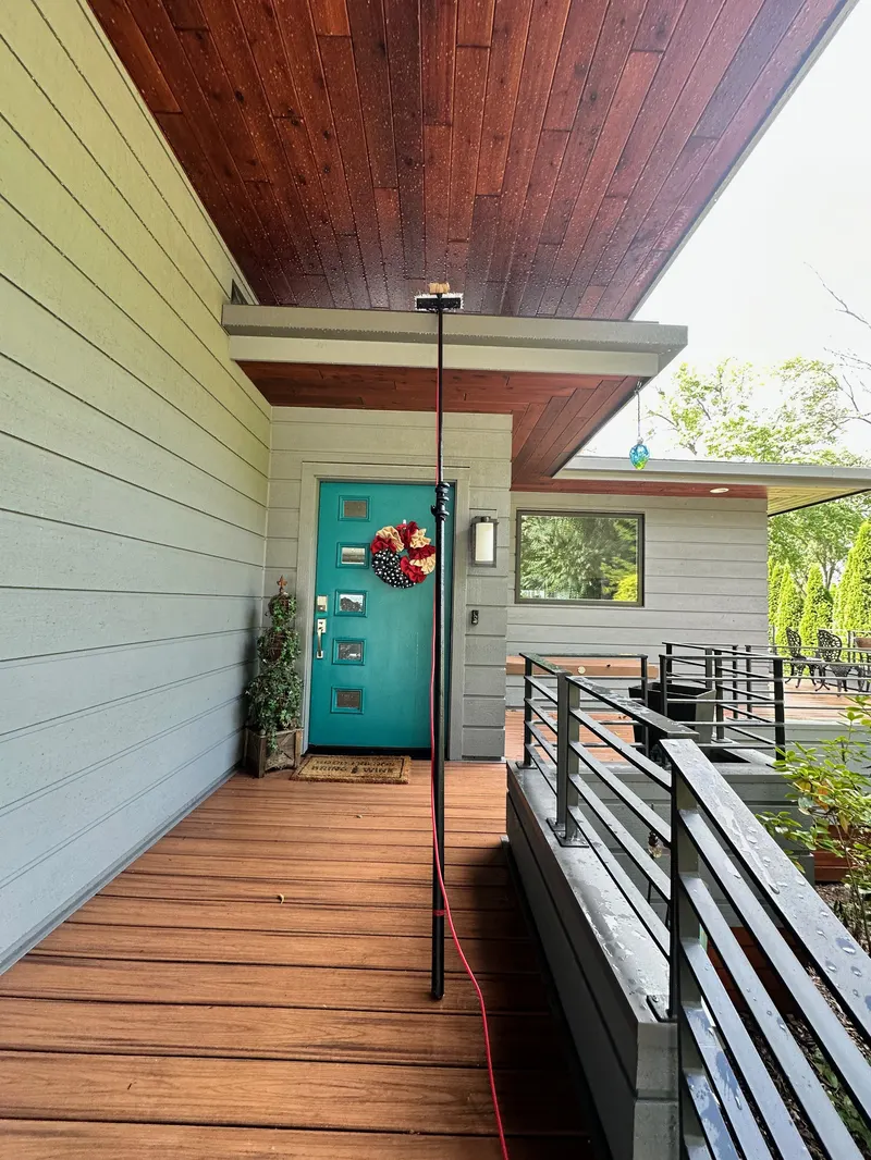Entry porch cleaning by The Total Wash Co.